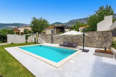 Image de Discover a cozy vacation home in Grižane, designed for up to four guests.