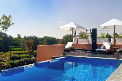 Image de Villetta Rossa - Amelkis Golf Marrakech. Villa de 7 chambres avec personnel.