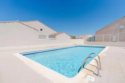 Image de Ib 293 Pavillon climatisé dans une résidence avec piscine