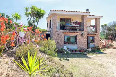 Image de Maison de vacances 'Casa Valeria Costa Paradiso' avec vue montagne, jardin privé et balcon