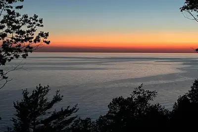 Image de Breathtaking Sunsets, Private Beach Access, Game Room, Fire Pit and More!
