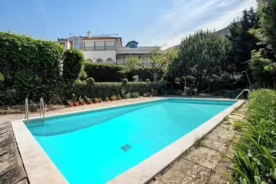 Image de Maison de vacances 'Casa Da Ladeira - São Martinho' avec vue sur la mer, piscine partagée et Wi-Fi