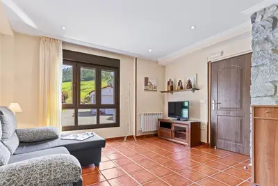 Image de Appartement 'La Cabaña' avec vue sur les montagnes et jardin privé
