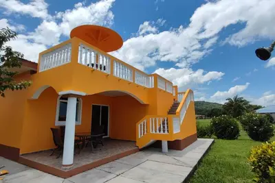 Image de This Hidden paradise located right on the Caribbean Ocean & big tall Mountains.