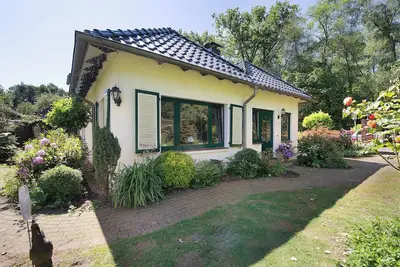 Image de Maison de vacances 'Im Grünen Winkel' avec terrasse partagée, jardin partagé et Wi-Fi