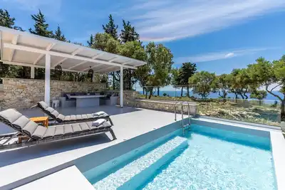 Image de Villa 'Antipaxos Sunset House' avec vue sur mer, Wi-Fi et climatisation