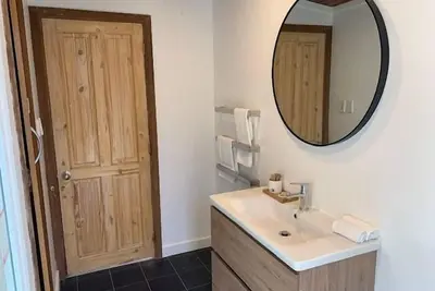 Two bedroom completely renovated quintessential Waiheke Bach