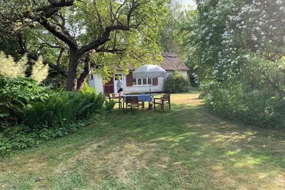 Image de Charming thatched-roof cottage from 1947
