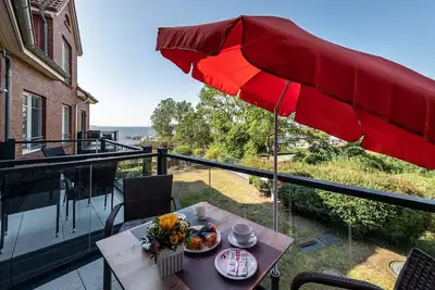 Image de Appartement 'Ferienwohnung Am Salzhaff B6' avec vue sur la mer, balcon et Wi-Fi