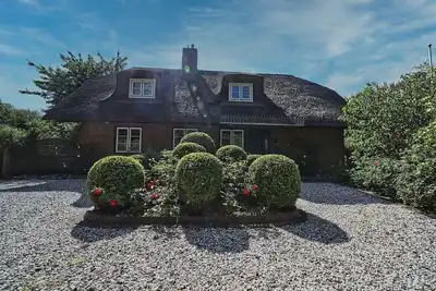 Image de Holiday home Haus unter Reet