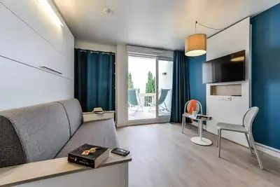 Image de Premium Studio fĂĽr 4 Personen, Schlafbereich und Balkon