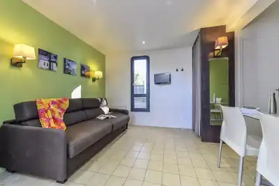 Image de Klassisches Bungalow-Apartment mit 1 Schlafzimmer und Terrasse für 3 Personen