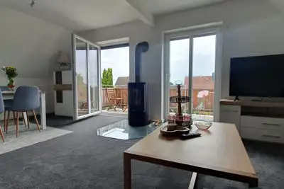 Image de Ferienwohnung mit Kamin, Balkon, Boxspringbett, 3 Personen, See-und Waldnähe