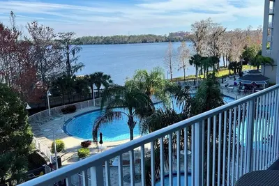 Image de Best Location: 1 mi to Disney World! Chic Lakefront Resort Condo w Coastal Vibes