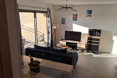 Image de appartement T3 de 61m2 neuf et climatisé, proche du centre ville et de la plage