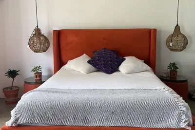 Image de Acogedoras habitaciones con decoraciones y colores a 15 minutos del parque.