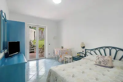 Image de Appartement '101 Monolocale Vista Giardino' avec terrasse privée, Wi-Fi et climatisation