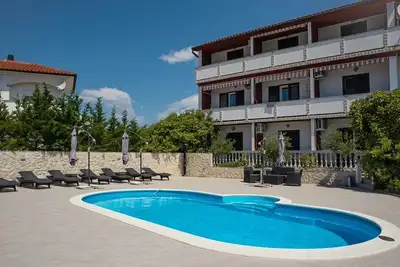 Image de Appartement de deux chambres avec le balcon Lopar, Rab (A-22978-b)