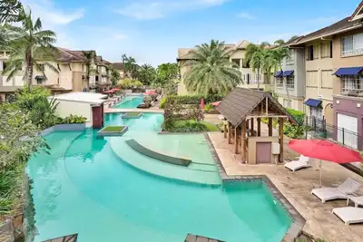 Image de Lotus Lakes - Tropical 2br Retreat | Resort Pools | Near Cairns Cbd & Botanical Gardens