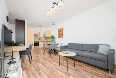 Image de Spacious Apartment with Parking and Balcony by Noclegi Renters