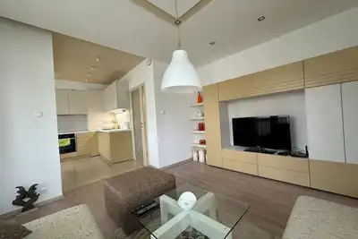 Image de Appartement moderne, calme et chaleureux! Parking privé souterrain!