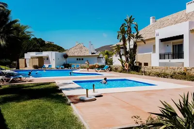 Image de Chalet 'Comodo Triplex La Cala Golf' avec piscine partagée, Wi-Fi et climatisation