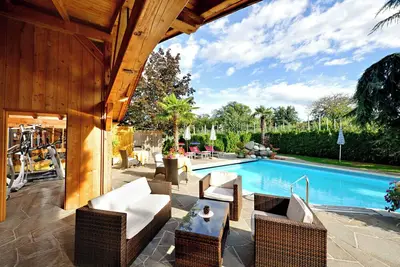 Image de Chalet '5 55m²' avec vue sur la montagne, piscine commune et Wi-Fi