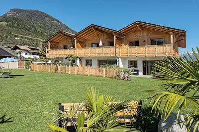 Image de Chalet '3 65m²' avec vue sur la montagne, piscine commune et Wi-Fi
