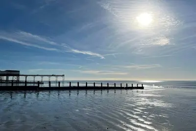 Image de An upside-down fisherman’s cottage with a large terrace, just a stones throw from the beach.