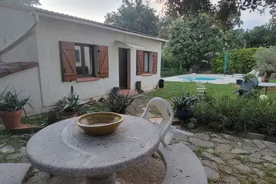 Image de Petite Maison Sous les Arbres