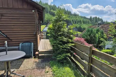 Image de Small vacation home with charm, right by the forest