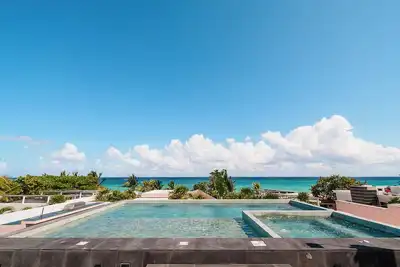 Image de Paradise in Playacar, 2 min walk to beach, 2 private Pools, 5 Bedroom 5 Bathroom