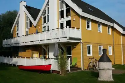 Image de Apartment Direkt am ScharmĂĽtzelsee, Ladestation fĂĽr E-autos Privater Gastgeber