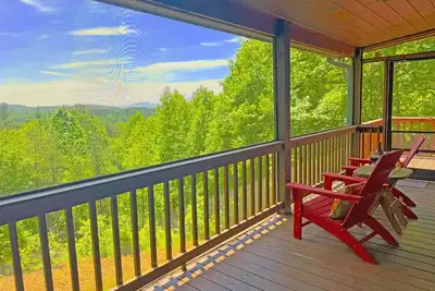 Image de Spectacular Mountain View, rustic log, hot tub, deck fireplace