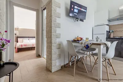 Image de Cala Delle Vigne – Appartement confortable près du centre et des plages de Porto TorresSitué dans l’une des rues principales de Porto Torres, dans un quartier calme et bien desservi, Cala delle Vigne offre l’atmosphère parfaite pour des vacances