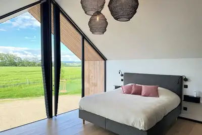 Image de Lodge avec vue panoramique depuis la chambre. Hottu en pleine nature.