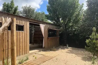 Image de Cabane Spa Premium 33m² (2 chambres) + terrasse couverte + Tv + Lv + Plancha + Draps + Serviettes 4 à 5 personnes - 4 pers. inc