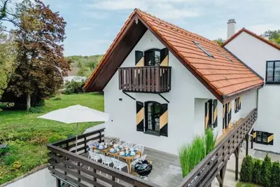 Image de Haus am See mit Sonnenterrasse für 8 Gäste