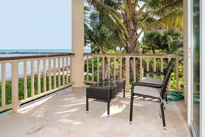 Beachfront Bliss: Stunning Oceanfront 2br Condo in Ambergris Caye!