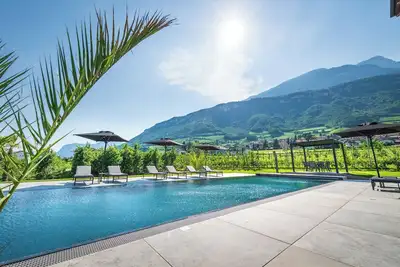 Image de Appartement \"SĂĽden\" com vista para a montanha, piscina e acesso Wi-Fi