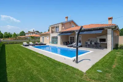 Image de Belle maison Ă Maruzini avec WiFi