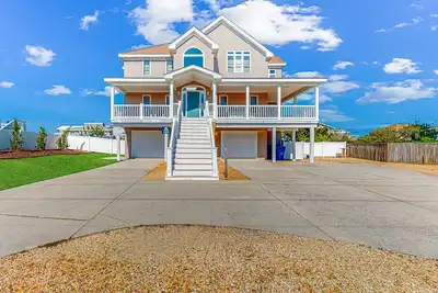 Image de Three-story beach dream with a private pool, decks, & central Ac