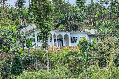 Image de O-T on the rise Bed and Breakfast, three miles away from the Blue Mountain Peak.