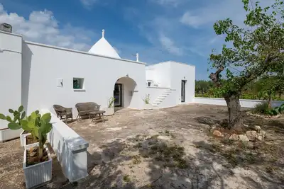 Image de Villa 'Trullo Bianco Molillo' avec jardin privé