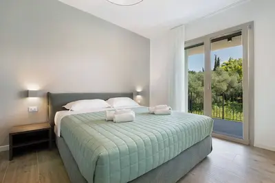 Image de Appartement 'Eleonora C1' avec piscine partagée, terrasse privée et climatisation