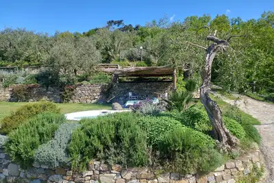 Image de Alloggio nel Verde a 4 km Dalla Città per Coppia o Famiglia di 3 Persone