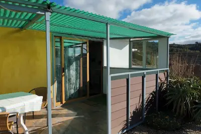 Image de Kleines Ruhiges Duplex Ferienhaus mit Sonnenterasse, Garten und Liegeflaeche