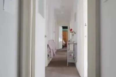Double room in spacious flat right next to the sea for some summer fun!
