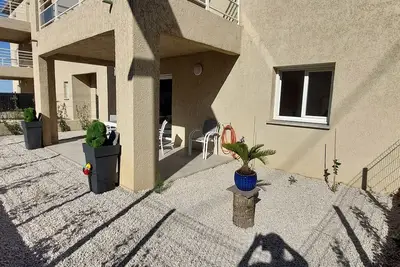 Image de Nouveau! F2 Neuf Avec Terrasse et Jardin Ă A Casetta, Ă 8 min de la Plage