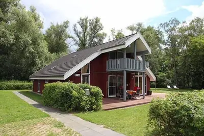 Image de Waldkauz 64 - GroĂźes Freistehendes Ferienhaus fĂĽr 9 Personen mit GroĂźem Garten